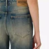 Pantaloni a zampa in denim di cotone