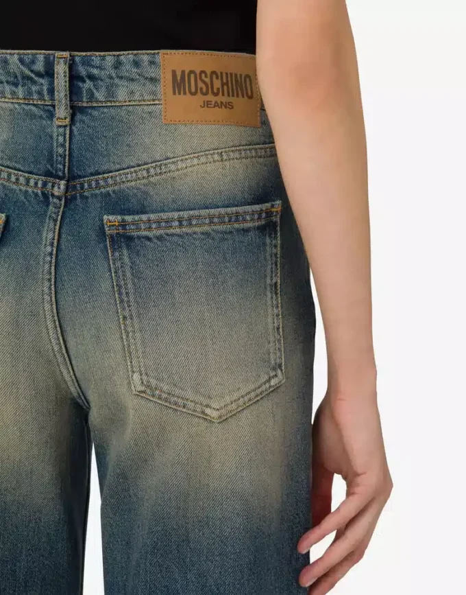 Pantaloni a zampa in denim di cotone