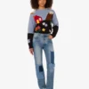 Pantaloni in denim patchwork Pantaloni in denim patchwork