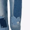 Pantaloni in denim patchwork Pantaloni in denim patchwork
