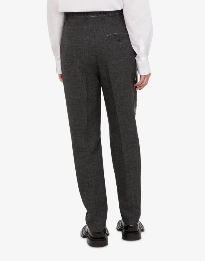 Pantaloni in tela di lana ricamata